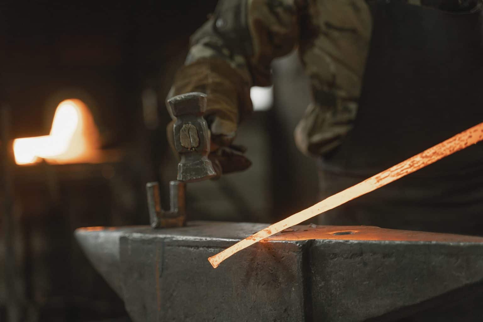 Hammering a forged steel