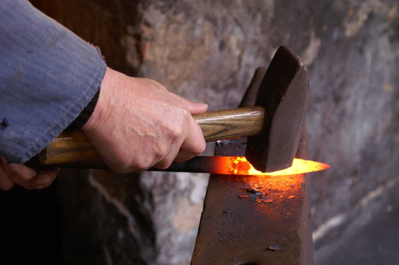 Hammering a hot bright knife