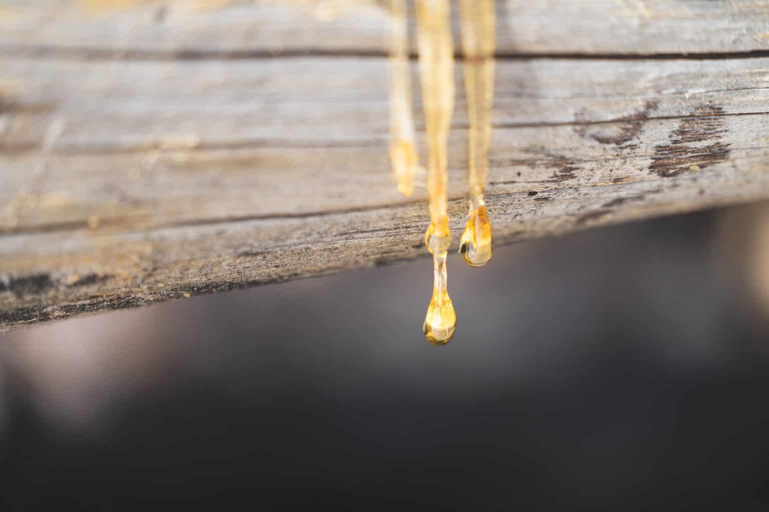 Resin pouring down the wood