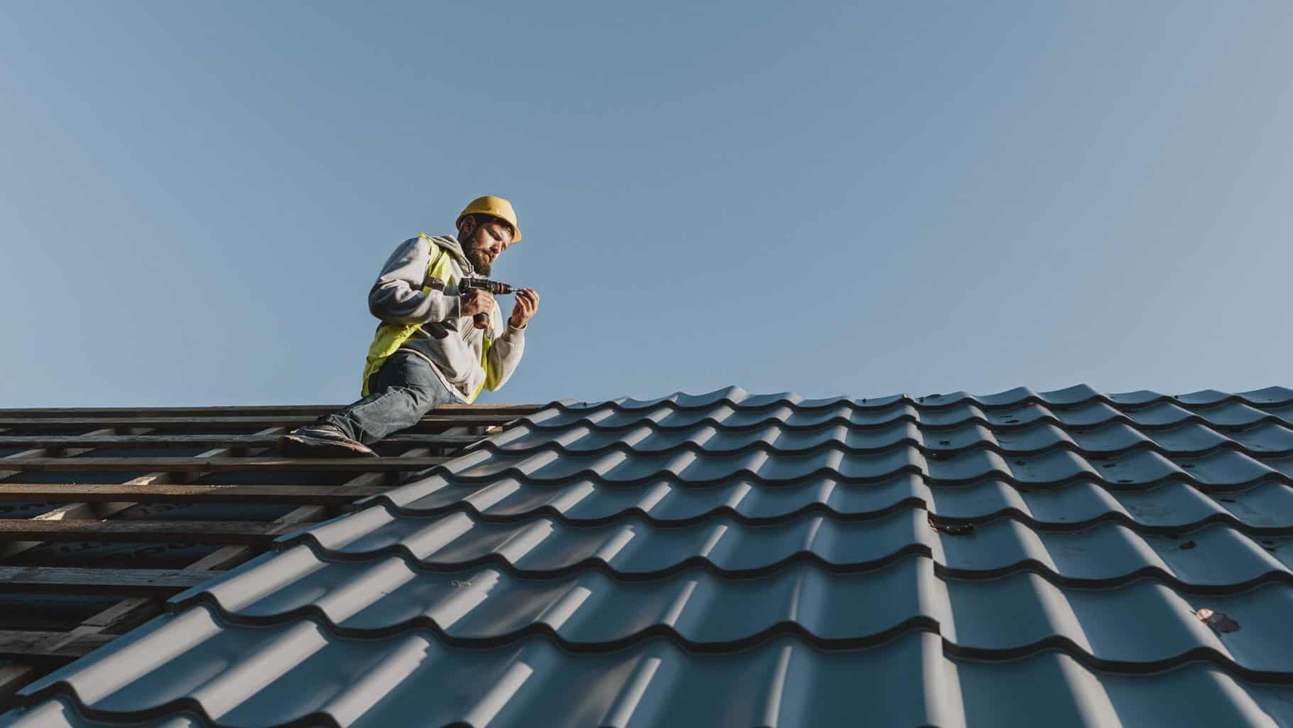 A construction worker on the roof