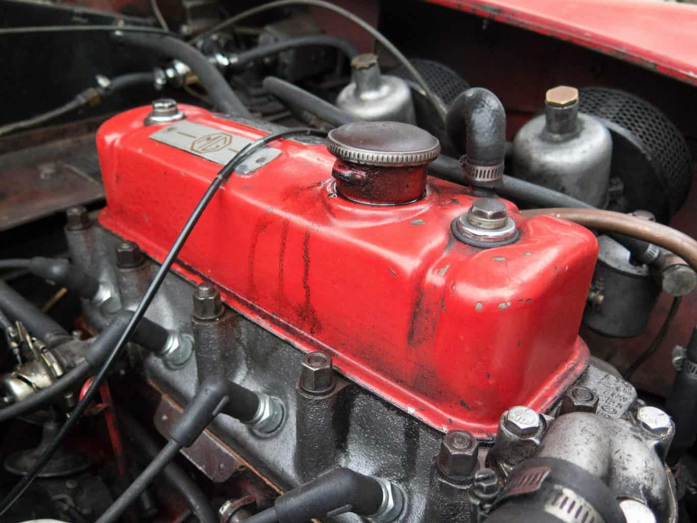 A red oil tank in an engine block
