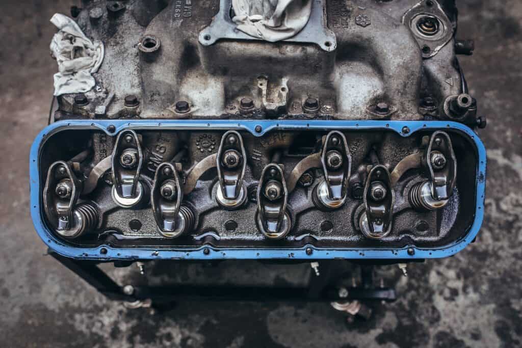 An oily engine block removed from the car