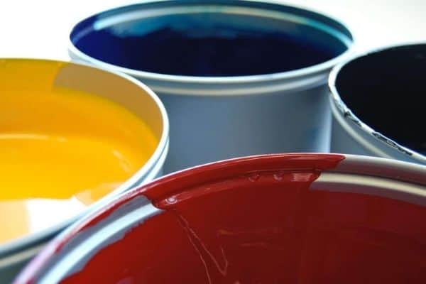 Buckets of paint with different colors