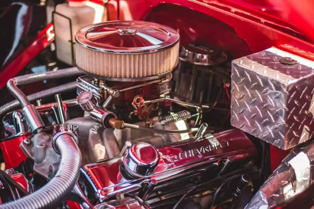A car engine of a red tone car