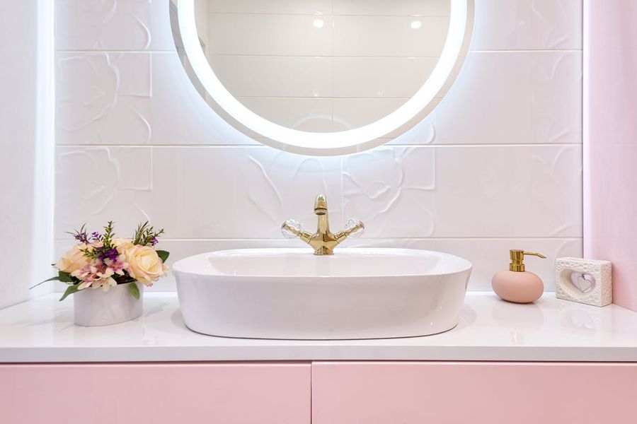 Vanity room with ceramic sink