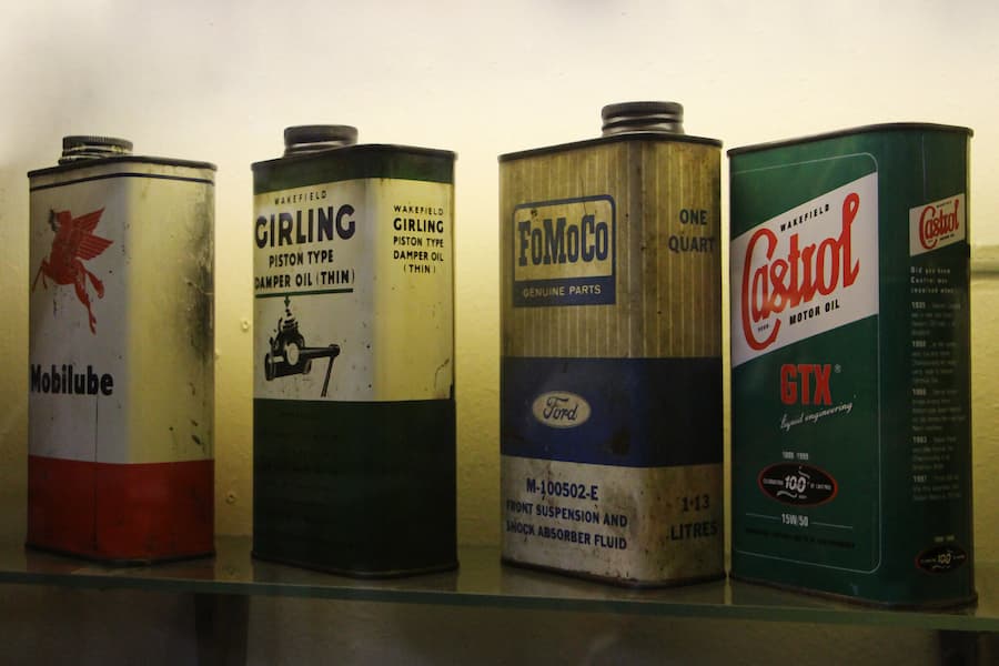 Motor oils displayed on top of glass